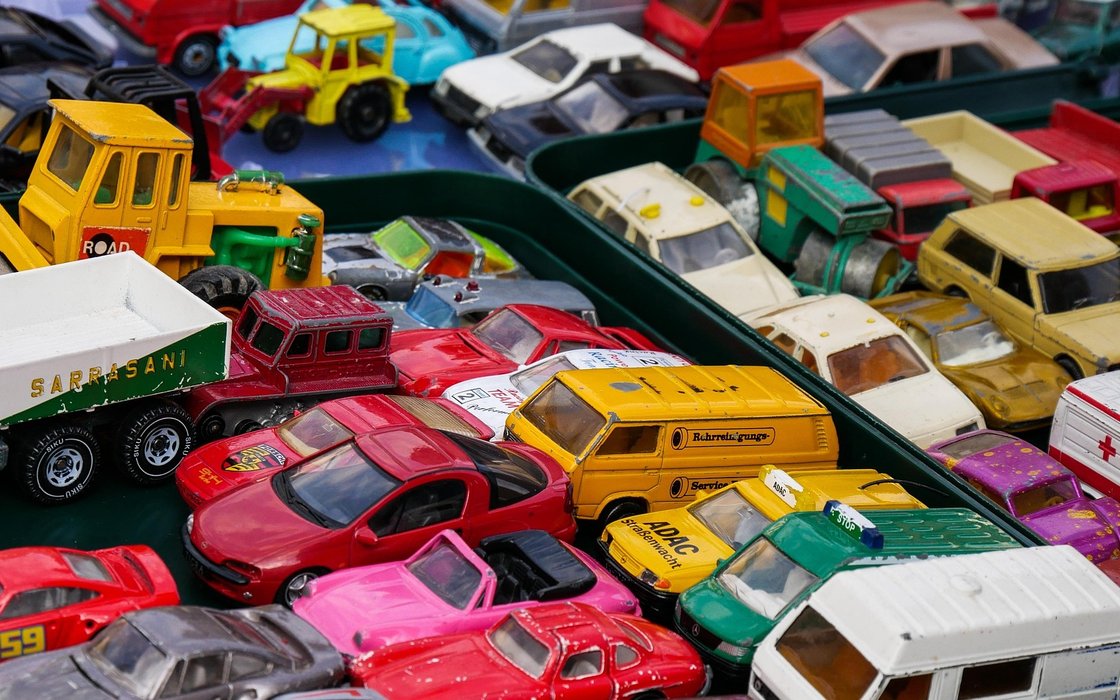 A tray piled with vintage diecast cars
